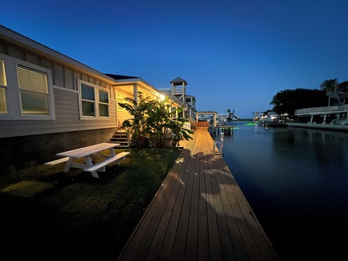 GREAT family home with a great place to sit and relax…canal view!! 