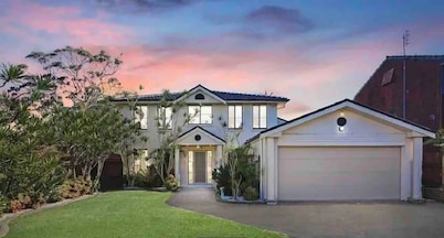 Large Holiday Home with Heated Pool on demand near Lake & Beaches