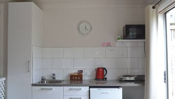 Fridge, microwave, electric kettle, toaster