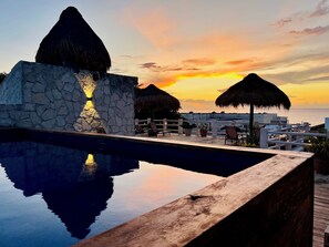 Outdoor pool - Deluxe Suite: Private Balcony, King Bed & Steps to the Cozumel Waterfront (San Miguel)