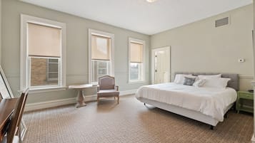 Individually decorated, desk, laptop workspace, iron/ironing board