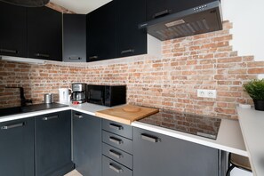 Fridge, microwave, coffee/tea maker, high chair