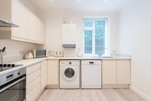 Fridge, microwave, oven, cookware/dishes/utensils