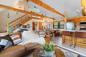 DVD-soitin, pöytäjalkapallopöytä, kirjoja, videokirjasto