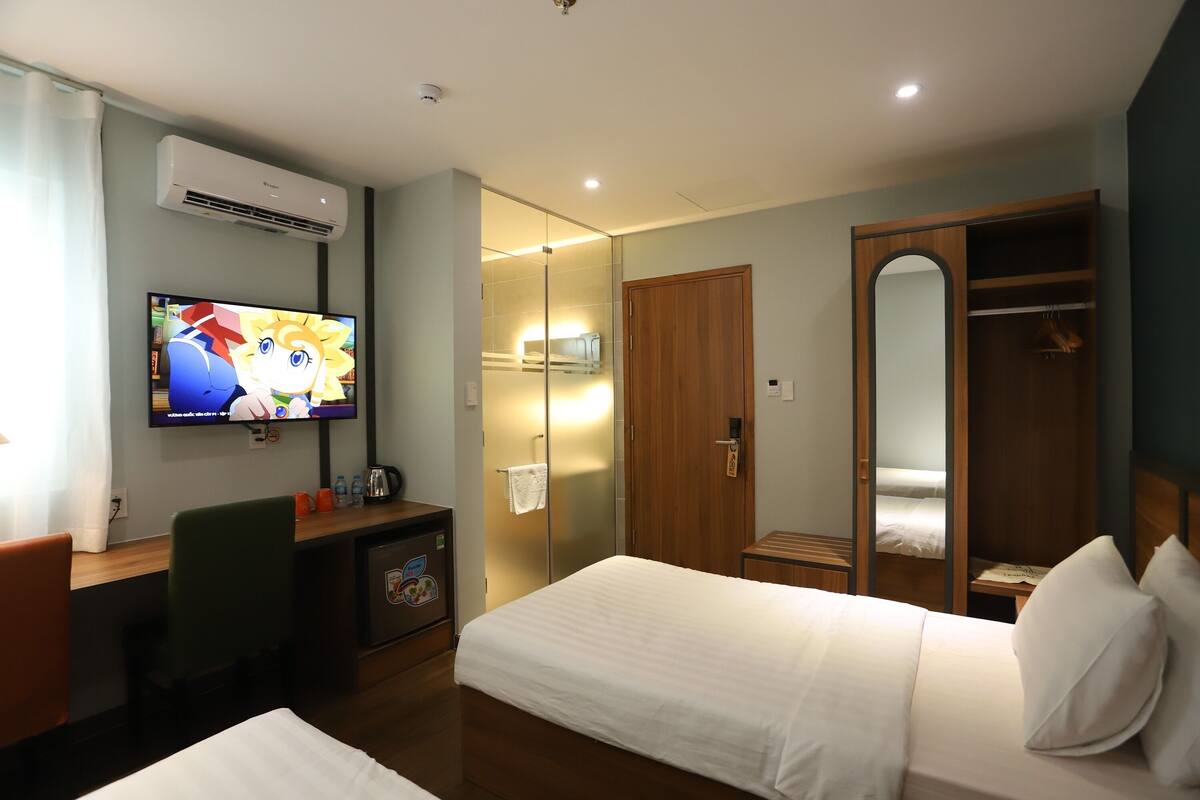 ห้องดีลักซ์ทวิน | โต๊ะทำงาน, ผ้าม่านกันแสง, Wi-Fi ฟรี, ผ้าปูที่นอน
