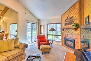 TV, fireplace, books
