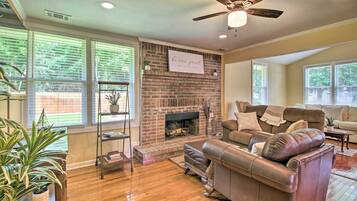 TV, fireplace, books