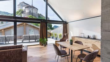 Deluxe Studio Suite, 1 Bedroom, Non Smoking, Sauna | Living area | 43-inch Smart TV with cable channels, TV