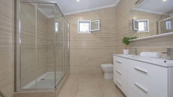 Bathtub, hair dryer, towels