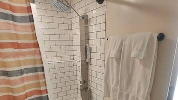 Hair dryer, towels, soap, shampoo