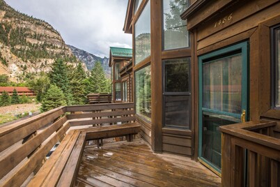 Riverwalk Retreat | Private Deck | Walk to Main St