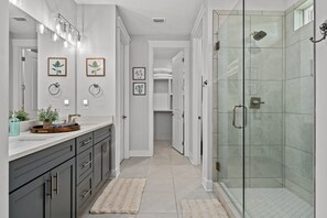 Shower, hair dryer, towels, toilet paper