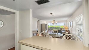 Coffee/tea maker, fridge, microwave, oven - Steps to the Sand: Gulfside 2BR at Whitney Beach w Pool & Sunset Views by RVA (Longboat Key)