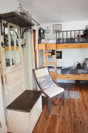 1 bedroom, desk, iron/ironing board, travel crib