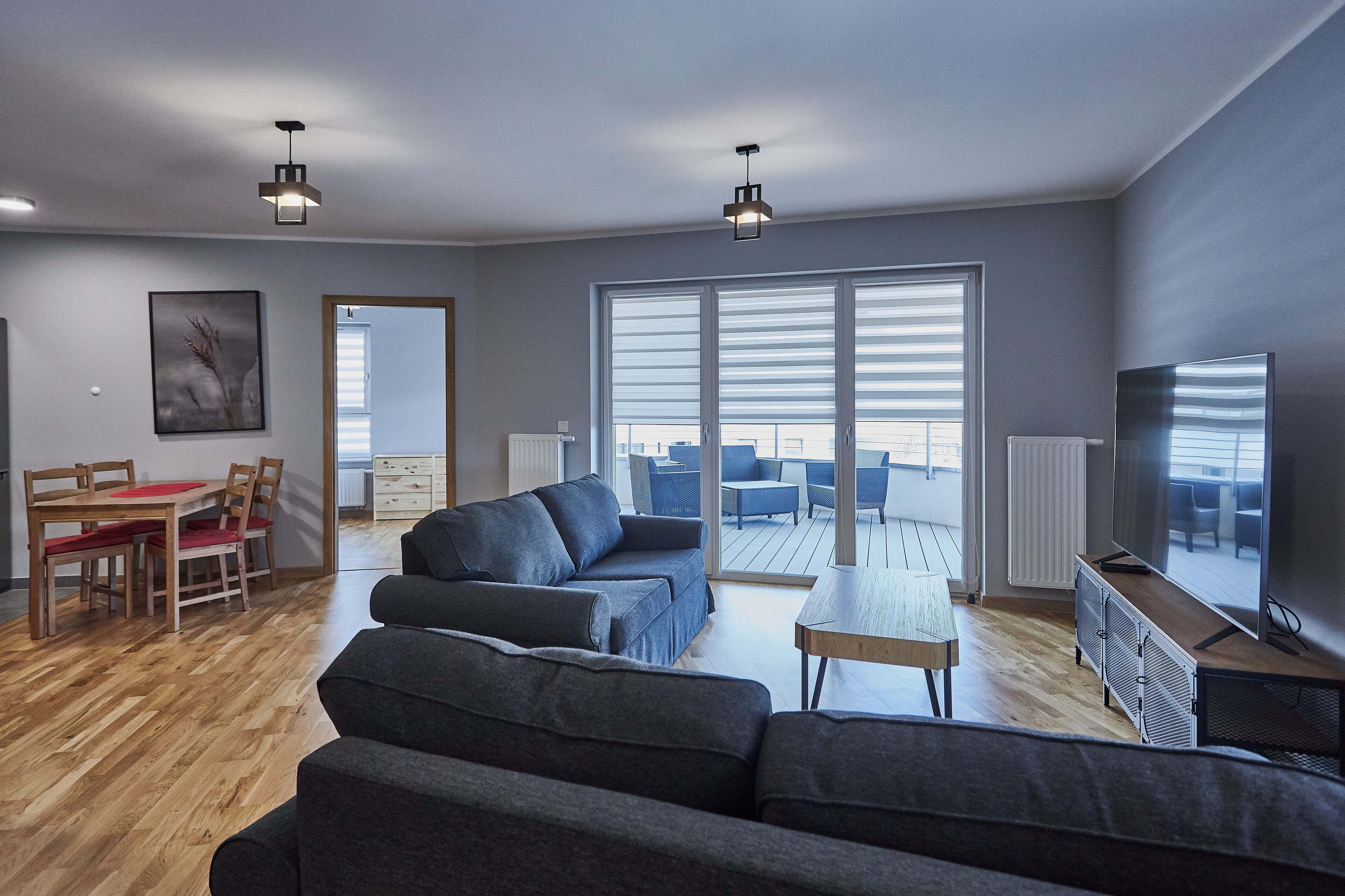 Family Apartment | Living area | 40-inch flat-screen TV with digital channels, TV