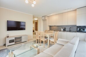 Classic Apartment | Living area | 40-inch flat-screen TV with digital channels, TV
