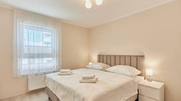 Apartamento superior | Tabla de planchar con plancha, wifi gratis, ropa de cama