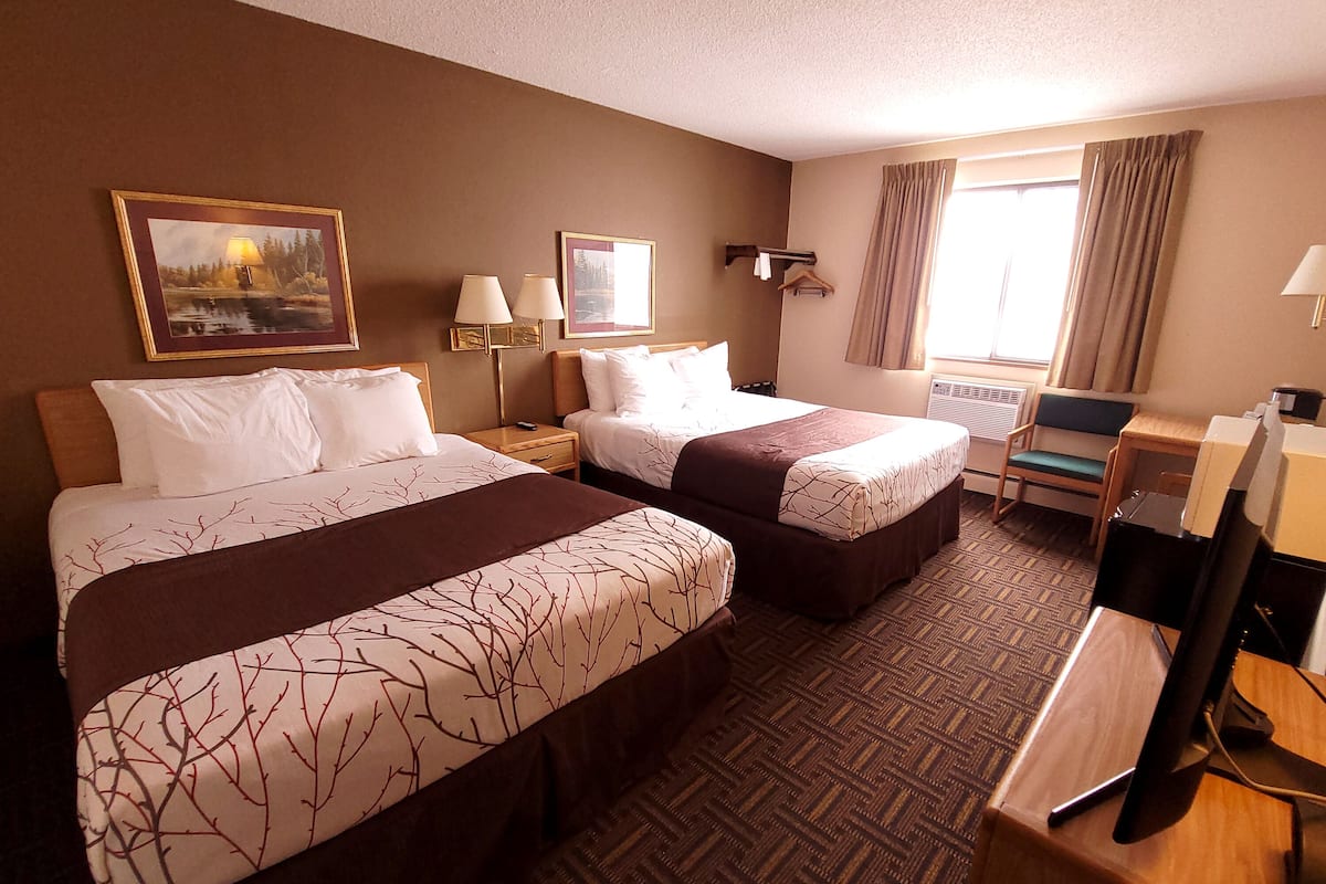 Basic Room | Down comforters, pillowtop beds, laptop workspace, iron/ironing board