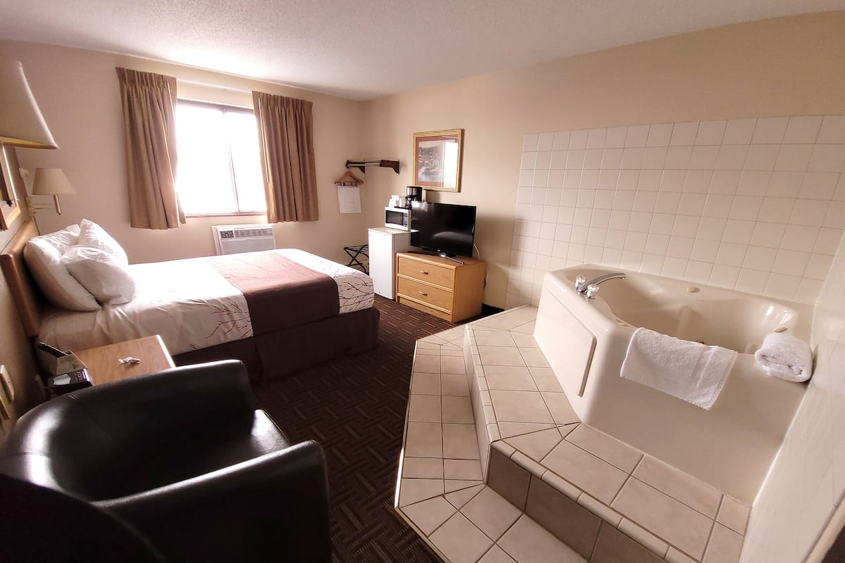 Luxury Room | Down comforters, pillowtop beds, laptop workspace, iron/ironing board