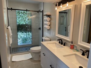 Combined shower/tub, hair dryer, towels, soap