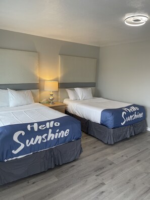 Chambre Deluxe double, 2 lits doubles | Accès au Wi-Fi (inclus), literie fournie, accessible en fauteuil roulant