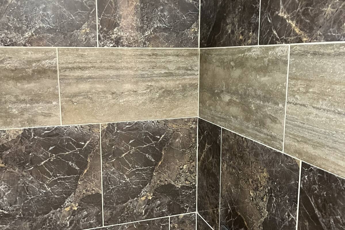 deluxe double room, 1 king bed | bathroom | rainfall showerhead, free toiletries, hair dryer, towels