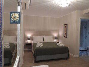 Premium bedding, memory-foam beds, minibar, in-room safe