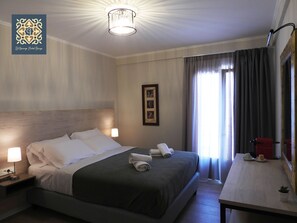 Premium bedding, memory-foam beds, minibar, in-room safe