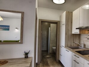 Shower, towels, soap, toilet paper