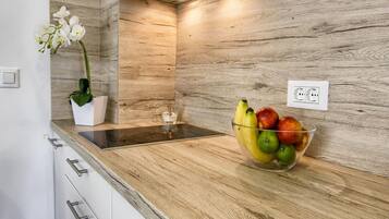 Fridge, microwave, cookware/dishes/utensils