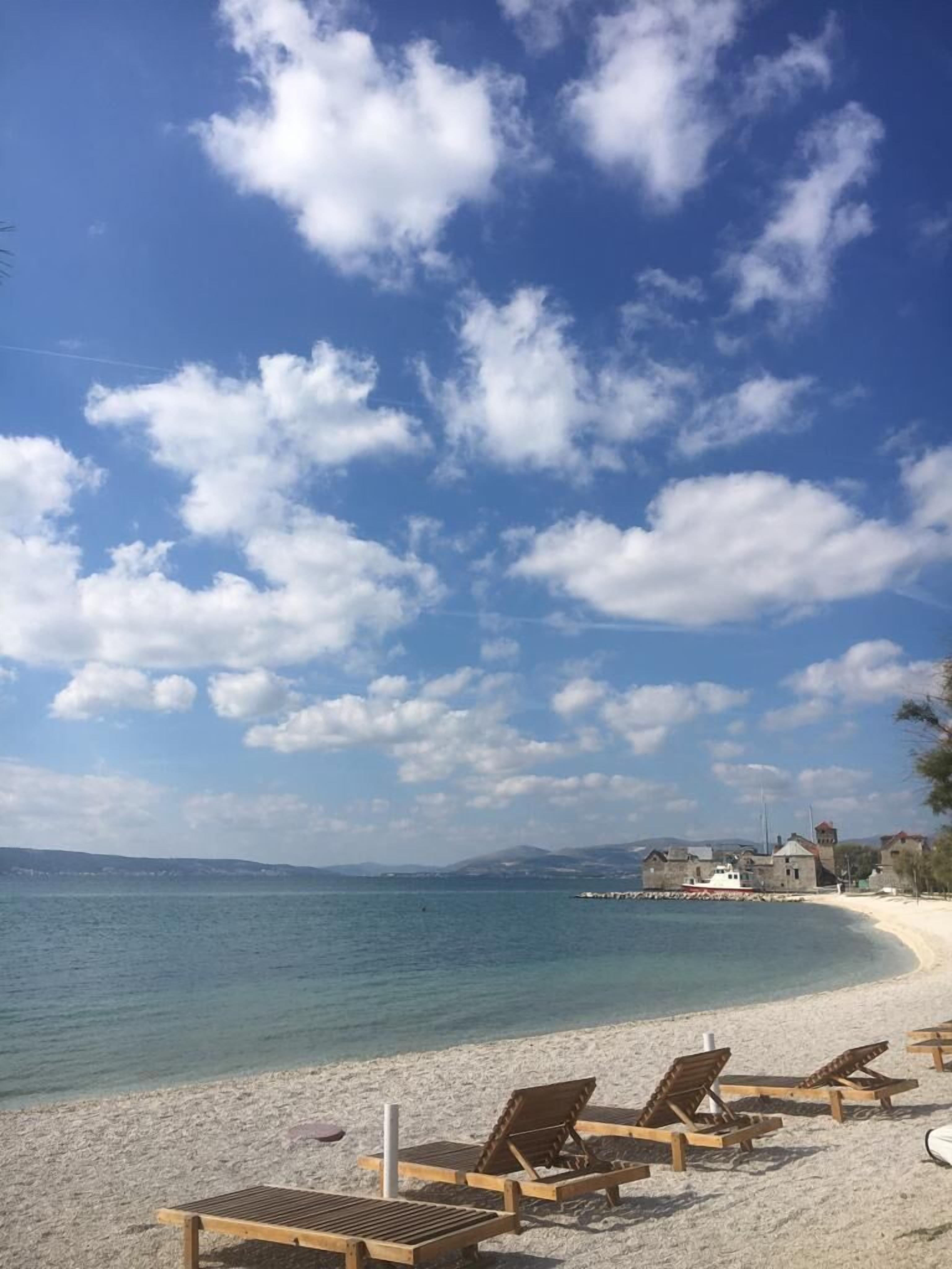 Una spiaggia nelle vicinanze, teli da spiaggia