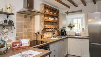 Fridge, electric kettle, cookware/dishes/utensils