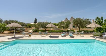 COMPLEX OF TRULLI WITH SWIMMING POOL SURROUNDED BY NATURE. GREAT LOCATION:FORNO