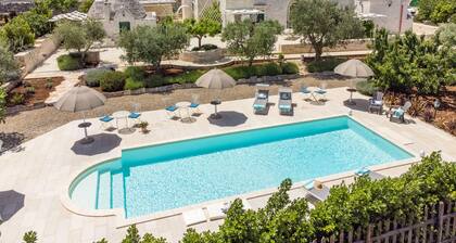 COMPLEX OF TRULLI WITH SWIMMING POOL SURROUNDED BY NATURE. GREAT LOCATION:FORNO