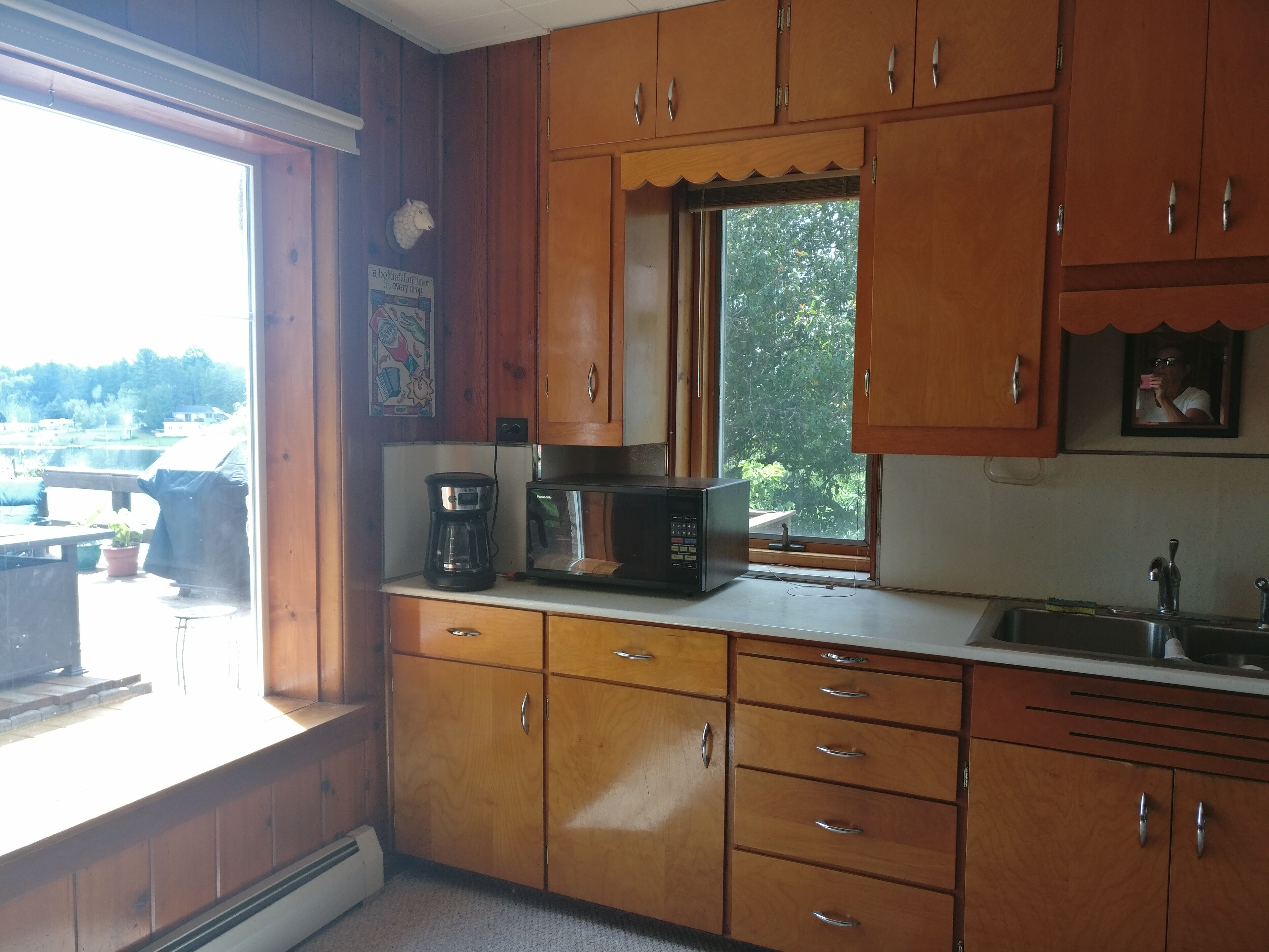 Stone house with knotty pine interior