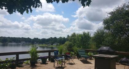 Stone house with knotty pine interior
