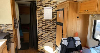 Class A motor home on large lot