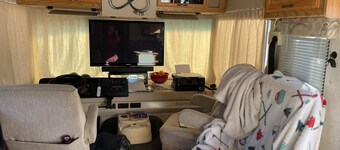 Class A motor home on large lot