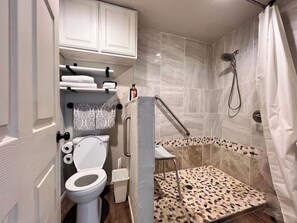 Bathtub, hair dryer, towels
