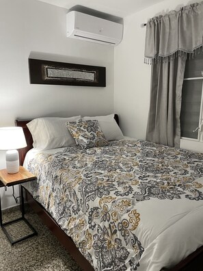 2 bedrooms, desk, iron/ironing board, travel crib