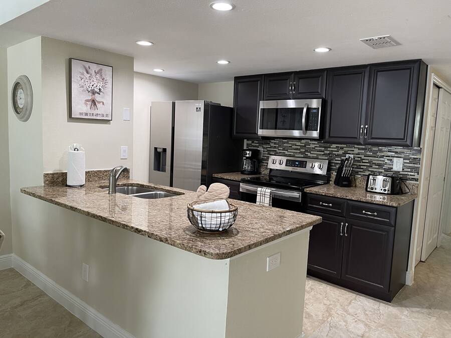 Apartamento família | Cozinha privada | Geladeira grande, micro-ondas, fogão, lava-louças