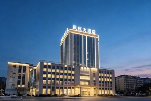 Xundian Fengyi Hotel (Tangdian Passenger Transport Terminal)
