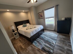 2 bedrooms, desk, blackout curtains, iron/ironing board