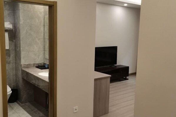 A modern bathroom with a marble sink and a shower. - Hancun River Villa (Beijing)