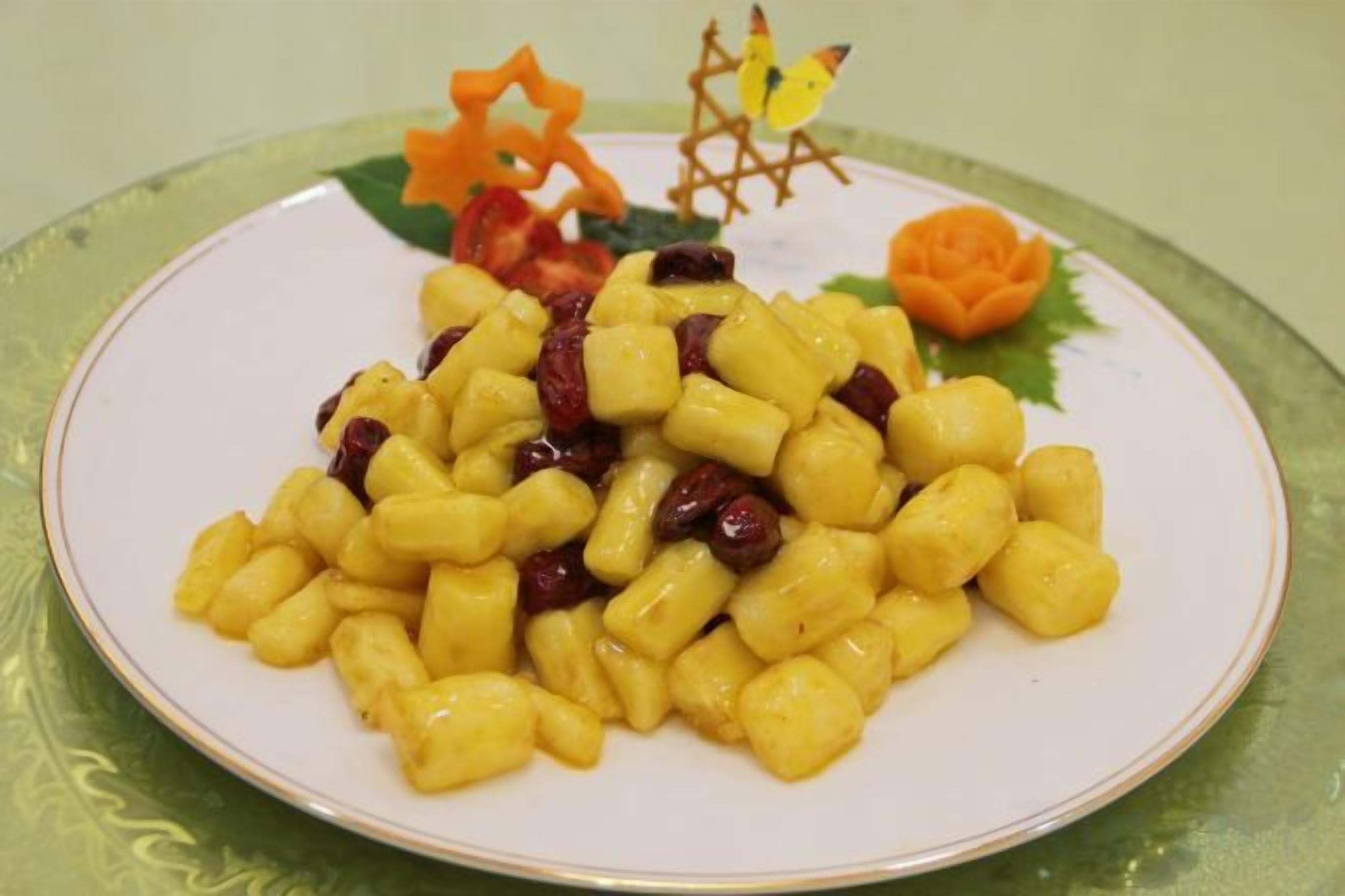 A plate of food with a decorative item on a table.