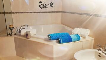 Shower, jetted tub, hair dryer, bidet