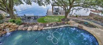 Luxury Lakefront Home with Pool, Private Dock, Game Room, Putting Green & Outdoor Oasis!