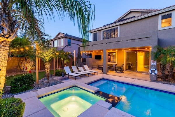 Dream backyard with pool, hot tub & putting green