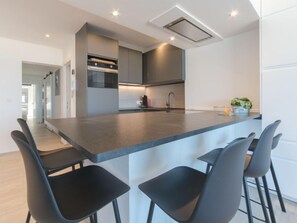 Fridge, dishwasher, cookware/dishes/utensils