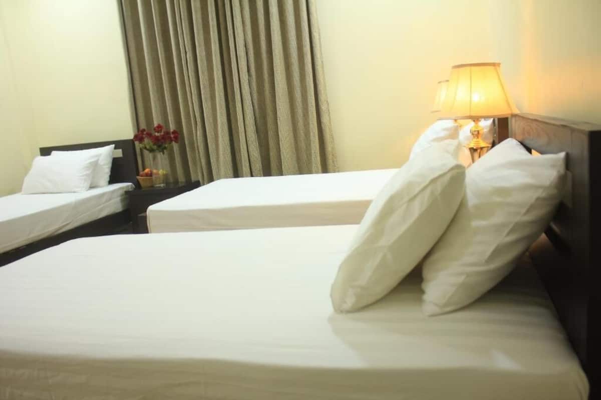 Deluxe Triple Room | Soundproofing, iron/ironing board, free WiFi, bed sheets